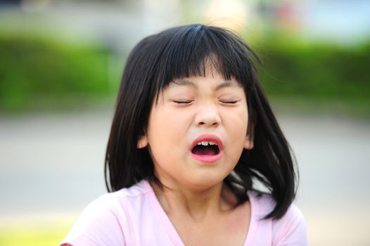 Girl sneezing