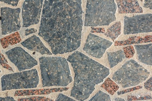 Pieces of granite tiles stacked on the street, shot in the afternoon