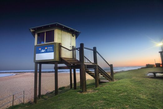 Another perfect day draws to a close.  This is the lifeguard's lookout tower at Toowoon Bay, Australia at dusk