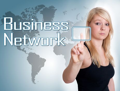 Young woman press digital Business Network button on interface in front of her