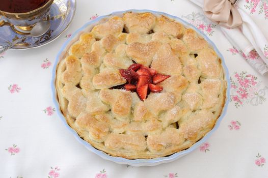 Cake from flaky pastry with strawberry jam