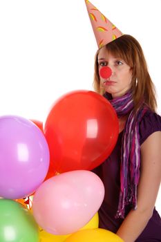 Sad girl with colored baloons isolated on the white