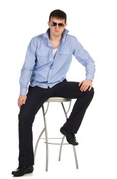 Funny guy sitting on the chair isolated on the white