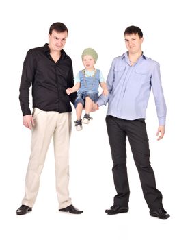 Two guys hold little boy on at white background