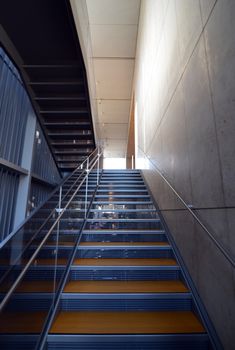 Modern metel stairs with wooden staircase