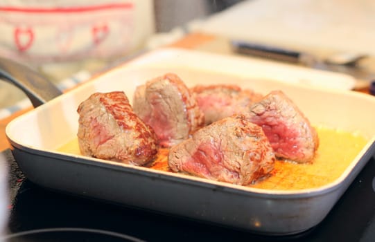 Steak slices roasted on giddle