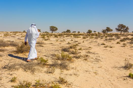 Arab in the Arabian desert on a hot sunny day