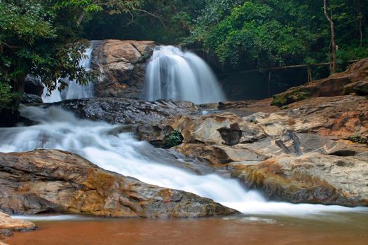 Waterfall in The forest at Chiang Mai , Thailand