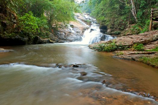 Waterfall in The forest at Chiang Mai , Thailand