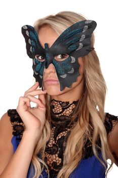 Lovely blonde part girl with butterfly shaped face mask
