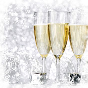 New year champagne and gifts with snowflakes and stars