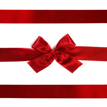 Red ribbon with bow isolated on white background