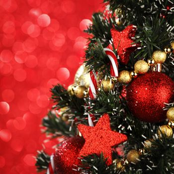  Beautiful decorated Christmas tree on glitter background