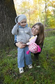 Mother and daughter on the walk in the park