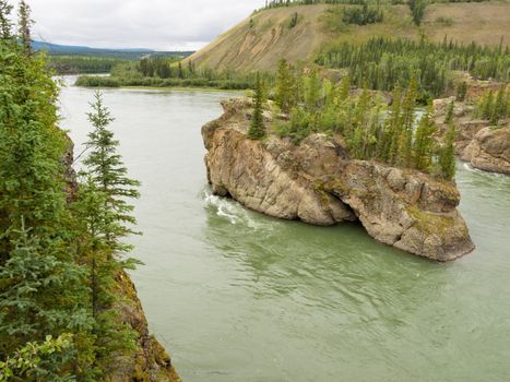 Treacherous Rock islands of Five Finger Rapids in Yukon River near town of Carmacks, Yukon Territory, Canada