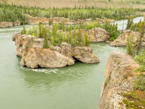 Treacherous Rock islands of Five Finger Rapids in Yukon River near town of Carmacks, Yukon Territory, Canada