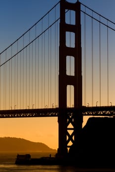 Vertical Image  Silhoutte of the Golden Gate Bridge at Sunset