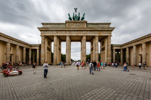 BERLIN, GERMANY - AUGUST 11: The Brandenburger Tor (Brandenburg Gate) is the ancient gateway to Berlin on August 11, 2013. It was rebuilt in the late 18th century as a neoclassical triumphal arch.