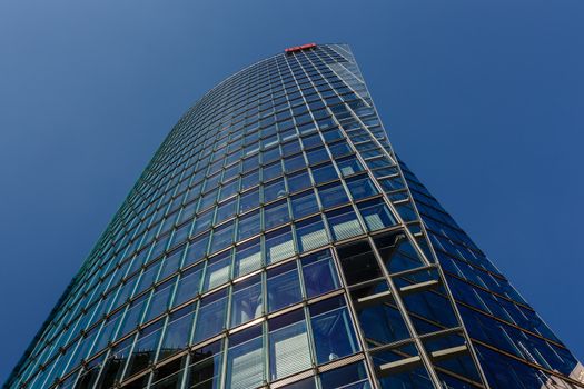 BERLIN - AUGUST 24: Glass Tower at Potsdamer Platz on August 24, 2013 in Berlin, Germany. The Potsdamer Platz is the new modern city center of Berlin.