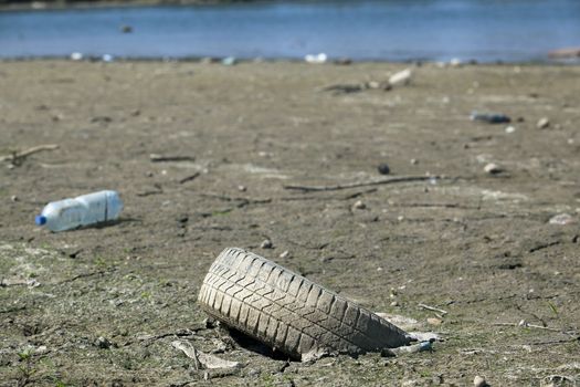 Old used car tires in the nature