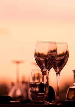 Romantic Glasses set in a romantic restaurant setting