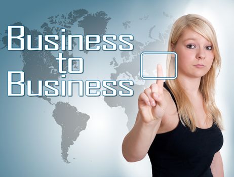Young woman press digital Business to Business button on interface in front of her