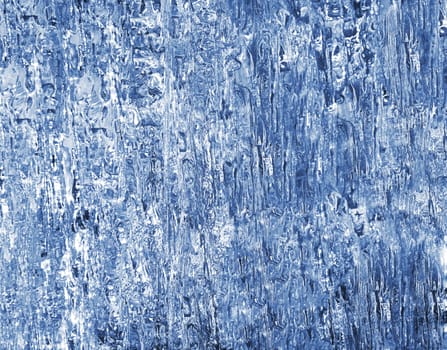 Block of blue smooth melting ice, close-up