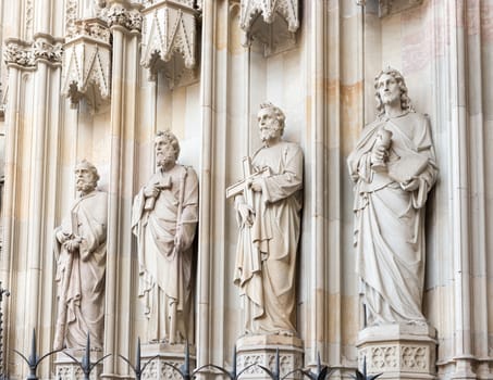 Barcelona cathedral statues of apostles at the entrance, Spain. The cathedral is in the heart of Barri Gotic (Gothic Quarter) of Barcelona 