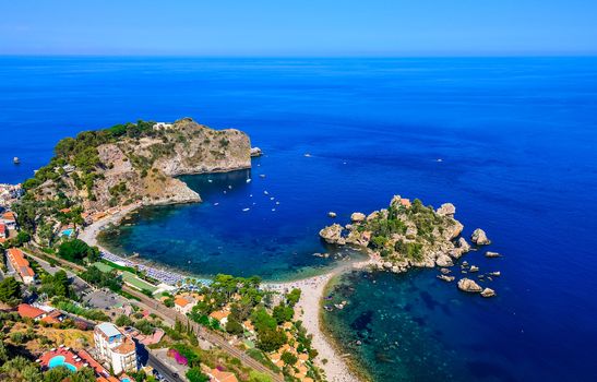 Aerial view of Isola Bella beach coast in Taormina, Sicily, Italy