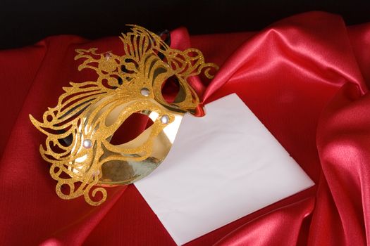 Woman mask with a card with red silk