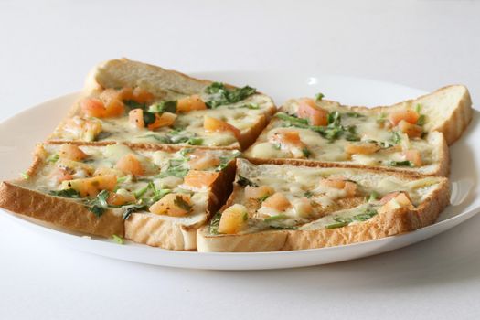 Bread pizza Breakfast in a plate with white background