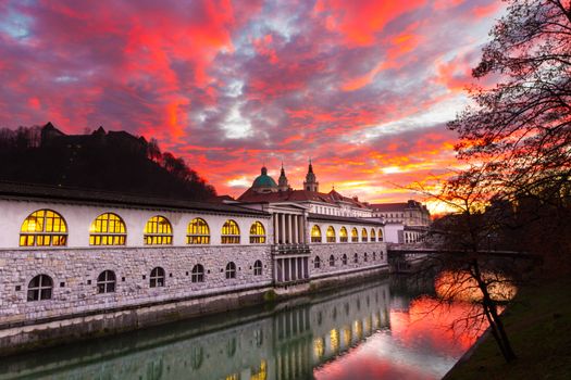 Ljubljana, Slovenia, Europe - Ljubljanica River and Central Market in sunset.  Ljubljana open market buildings was designed by famous architect Jo��e Plecnik.