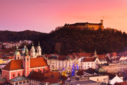 Aeirial panoramic view of romantic medieval Ljubljana's city centre, the capital of Slovenia, decorated for Christmas holidays. Ljubljana, Slovenia, Europe.