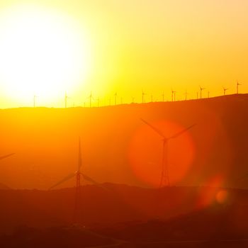 Wind turbines farm at sunset in southern Spain.