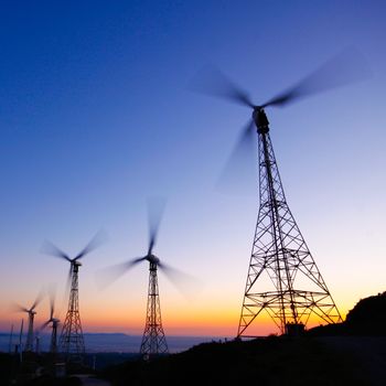 Wind turbines farm at sunset in southern Spain.