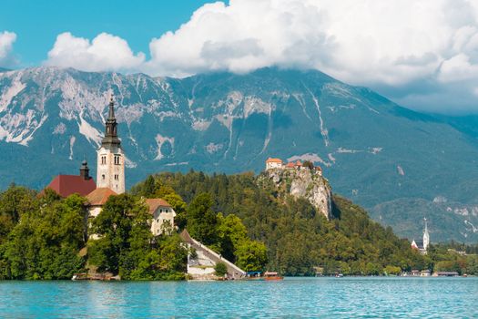 Panoramic view of  Lake Bled with St. Marys Church of the Assumption on the small island; Bled, Slovenia, Europe.