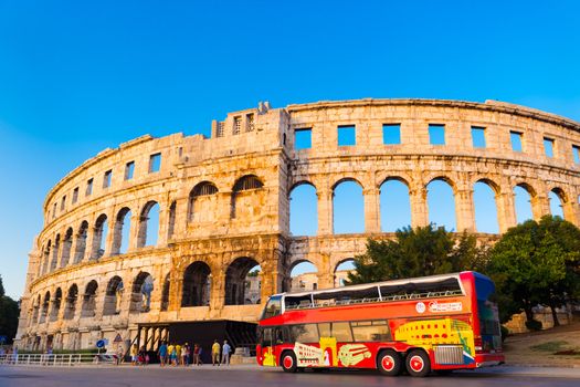 The Roman Amphitheater of Pula, Croatia shot at dusk. It was constructed in 27 - 68 AD and is among the six largest surviving Roman arenas in the World and best preserved ancient monument in Croatia.