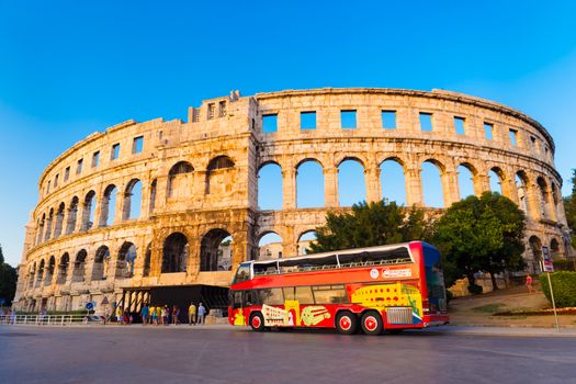 The Roman Amphitheater of Pula, Croatia shot at dusk. It was constructed in 27 - 68 AD and is among the six largest surviving Roman arenas in the World and best preserved ancient monument in Croatia.