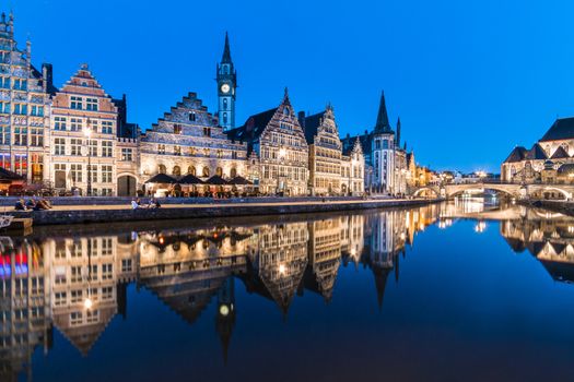 Picturesque medieval buildings overlooking the "Graslei harbor" on Leie river in Ghent town, Belgium, Europe.