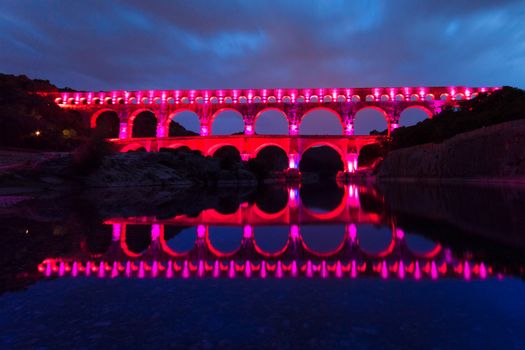 The Pont du Gard (Bridge of the Gard) is an ancient Roman aqueduct bridge that crosses the Gardon River in Vers-Pont-du-Gard near Remoulins, in the Gard d��partement of southern France, Europe.