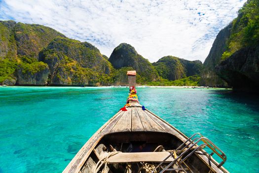 Traditional wooden  boats in a picture perfect tropical Maya bay on Koh Phi Phi Island, Thailand, Asia.