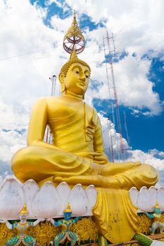 Footprint of the Buddha. Buddha statue situated on the top of the  limestone tower - Krabi Tiger Cave - Wat Tham Sua, Krabi, Thailand.