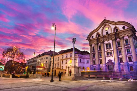 Ursuline Church of the Holy Trinity also Nun Church is a parish church in Ljubljana, the capital of Slovenia. It is located at Slovene Street, along the western border of Congress Square. Dramatic sunset shot.
