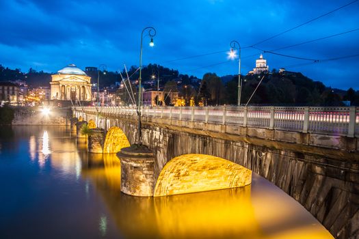 Panoramic view of bridge Vittorio Emanuele I and Chiesa della Gran Madre di Dio church in Turin, Italy, Europe. Shot in he dusk.