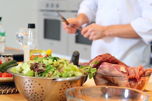 Meat and salad waiting to be prepared