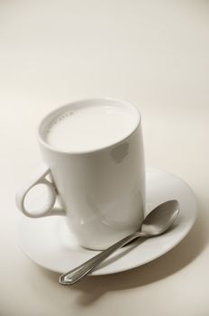 Hot milk cup on table