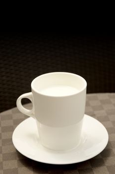 Hot milk cup on table