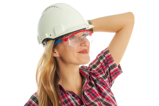 Young woman in a protective helmet and goggles on a white background