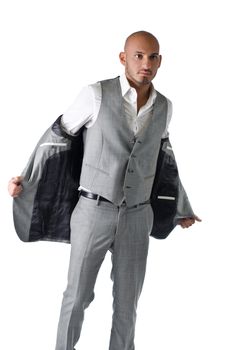 Elegant, bald young man in business suit, isolated on white, looking away