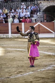 Ubeda, Jaen province, SPAIN - 29 september 2010: Spainish bullfighter Morante de la Puebla with montera in right hand and left hand rosemary thanking the public at the end of his show in the Bullring of Ubeda, Jaen province, Andalusia, Spain